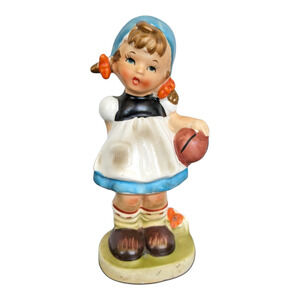 Ceramic Figurine Little Girl Holding Basket Ball
VINTAGE